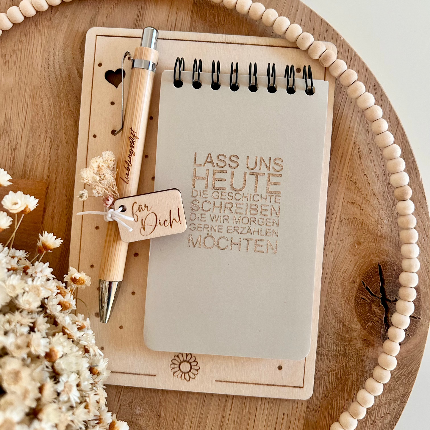 Brettchen für Notizblock Geschichte